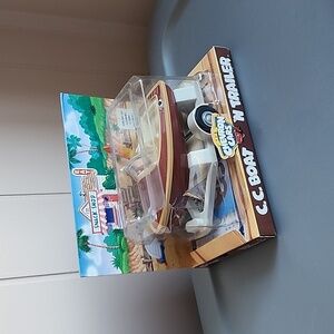 Cc boat n trailer  Chevron Car Collectible